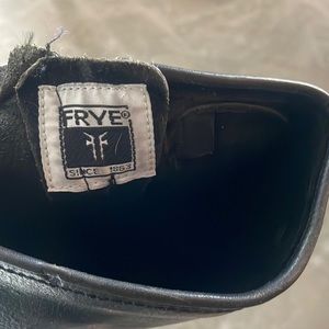 Black well worn Frye boots